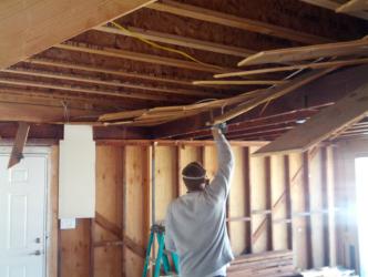 Removing the old roof structure.